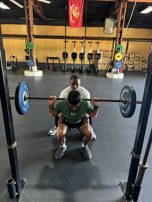 Barbell Squat Exercise- closed chain exercise targeting multiple muscle groups in the LE, also use for 1RM strength testing.